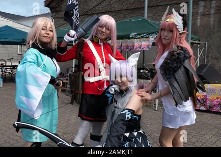 Teens and female friends at cosplay festival in Hakodate, Hokkaido, Japan, Asia. Young Japanese women and girls with anime and manga costume Stock Photo
