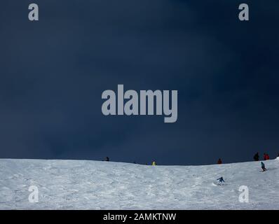 Skiers on the piste in the Westendorf ski area near Kitzbühel. [automated translation] Stock Photo