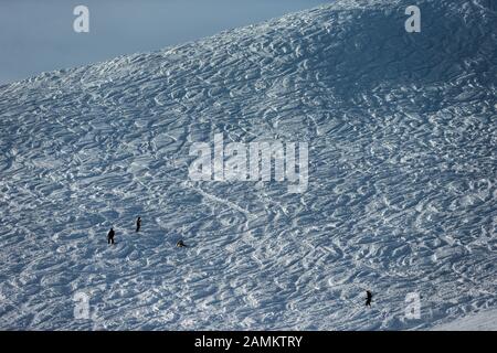 Skier on a deep snow slope in the skiing area Westendorf near Kitzbühel. [automated translation] Stock Photo