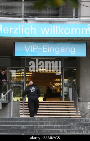 A new emergency accommodation for asylum seekers will be set up in the guest of honour area of the Munich Olympic Stadium. The picture shows a guard at the entrance to the new quarters. [automated translation] Stock Photo