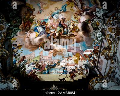 Interior view of the rococo collegiate church St. Maria of the former Augustinian monastery in Dießen am Ammersee. The picture shows a baroque ceiling painting in the nave by Johann Georg Bergmüller. [automated translation] Stock Photo