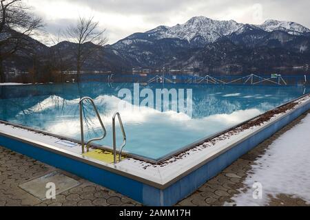 Open-air bathing area of the family bath 'Trimini' at the Kochelsee, which was closed for renovation work. In the background the mountains. [automated translation] Stock Photo