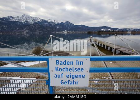 Footbridge in the open-air swimming area of the family pool 'Trimini' at Kochelsee, which was closed due to renovation work. In the background the mountains. [automated translation] Stock Photo