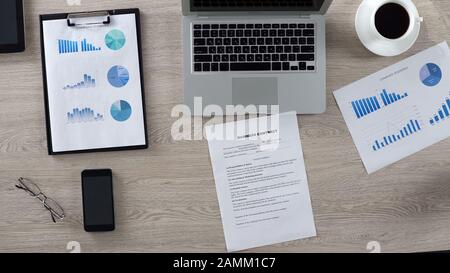 Important business contract lying on desk of businessman, office work, top view Stock Photo