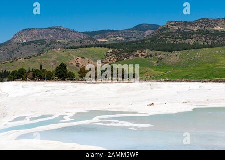 Natural travertine pools and terraces at Pamukkale ,Turkey. Pamukkale, meaning cotton castle in Turkish,Turkey Stock Photo