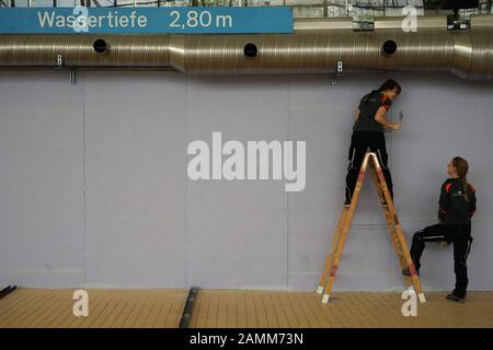 The Munich Olympic swimming hall is being completely renovated. In the picture work in a basin in which the water has been drained. [automated translation] Stock Photo