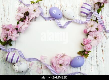 Easter greeting card with cherries blossom and eggs Stock Photo