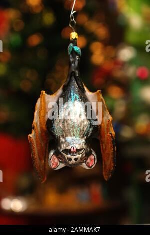 Unusual Christmas tree pendants in a cellar studio in the Westend. The picture shows a hanging bat. [automated translation] Stock Photo