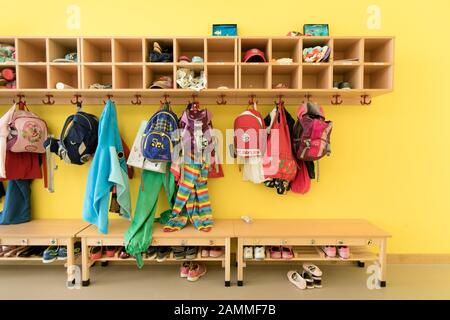 Cloakroom with children's clothes in the municipal day care centre (Kita) at Hogenbergstraße 33 in Laim. [automated translation] Stock Photo