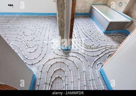 House construction with interior finishing of the underfloor heating and sanitary [automated translation] Stock Photo