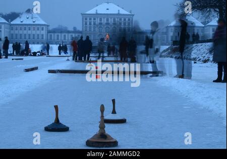 Curling on the frozen Nymphenburg Castle canal. [automated translation] Stock Photo