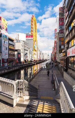 Dotonbori street entertainment area by its eccentric atmosphere and large illuminated signboards in Osaka,Japan Stock Photo