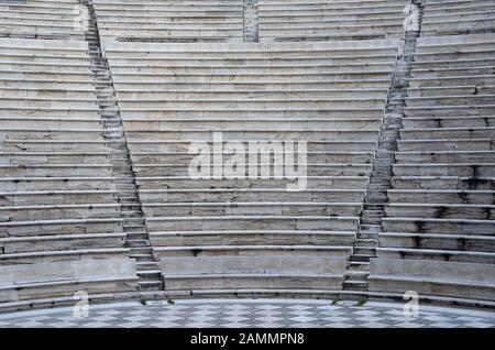Odeon of Herodes Atticus interior  in Athens, Greece. Also known as Herodeion is a stone Roman theater located on Acropolis hill slope. Stock Photo
