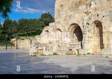 Odeon of Herodes Atticus facade in Athens, Greece. Also known as Herodeion is a stone Roman theater located on Acropolis hill slope. Stock Photo