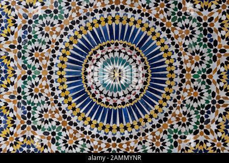 Colorful 24-fold star pattern in traditional islamic geometric design from the interior of Kasbah Telouet, Morocco. Stock Photo