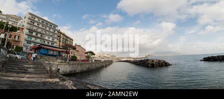 Naples - Italy- December 20, 2019: view of the promenade of Mergellina, with a marina, street vendors and boats Stock Photo