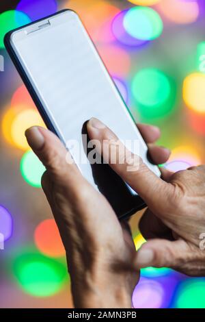 Closeup on elderly woman using he smart phone Stock Photo