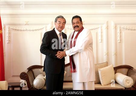 Colombo, Sri Lanka. 14th Jan, 2020. Sri Lankan Prime Minister Mahinda Rajapaksa (R) meets with Chinese State Councilor and Foreign Minister Wang Yi in Colombo, Sri Lanka, Jan. 14, 2020. Credit: Tang Lu/Xinhua/Alamy Live News Stock Photo