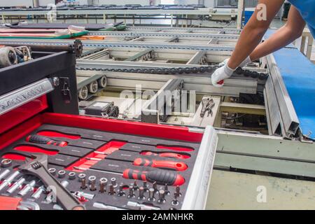 The set of hand tools for to repair. Many wrench and tools close-up in box for to repair the conveyor and car or replace automotive spare parts, auto Stock Photo
