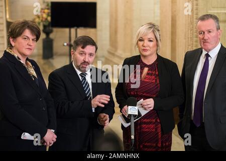 Northern Ireland First Minister Arlene Foster (left) Deputy First Minister Michelle O???Neill, Health Minister Robin Swann (centre left) and Finance Minister Conor Murphy at a press conference to announce that nurses in Northern Ireland will receive a pay rise in a "breakthrough" bid to end strike action which has paralysed the health service in Northern Ireland. Stock Photo