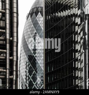 City of London financial architectural landmarks including the iconic Gherkin, Lloyds Building (left) and Willis Towers (right). Stock Photo