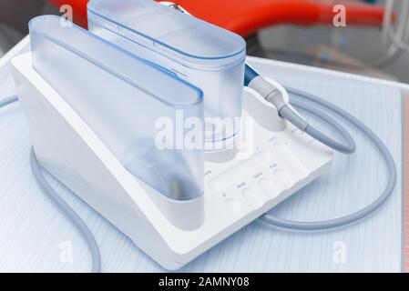 Ultrasonic scaler in the dental office. Dentistry Concept. Stock Photo