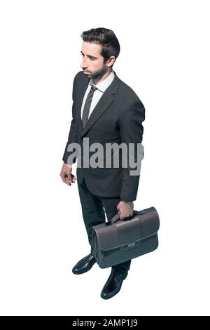 Businessman standing with briefcase on white background, business and finance concept Stock Photo