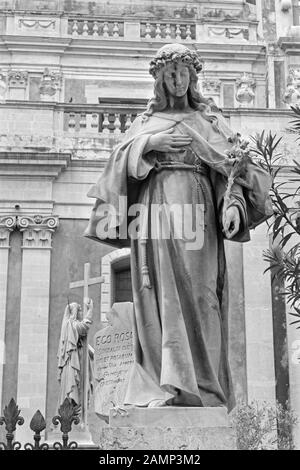 CATANIA, ITALY - APRIL 7, 2018: The statue of St. Lucy in front of Basilica di Sant'Agata. Stock Photo