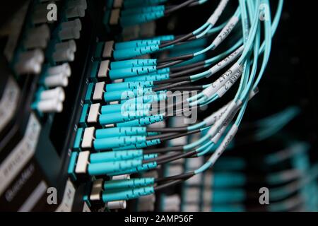 Close up shot of router cables in a data centre cabinet. Stock Photo