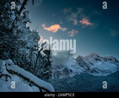 Snow covered Eibsee and Zugspitze in perfect light Stock Photo