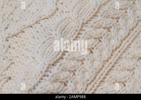 Close up shot of the stitching detail on a traditional Aran knitwear sweater. Stock Photo