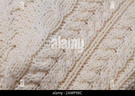 Close up shot of the stitching detail on a traditional Aran knitwear sweater. Stock Photo