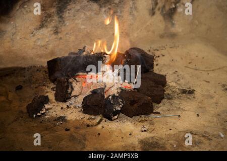 A traditional peat turf fire. Stock Photo