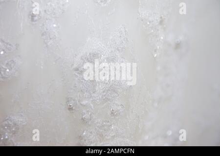 Close up of the lace detail on a wedding dress. Stock Photo