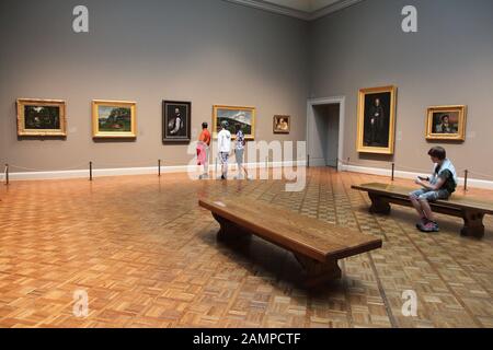 CHICAGO, USA - JUNE 28, 2013: Visitors admire art at famous Art Institute of Chicago. It is the 2nd largest art museum in the US with 1 million square