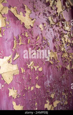Grunge peeling purple paint background texture. Stock Photo