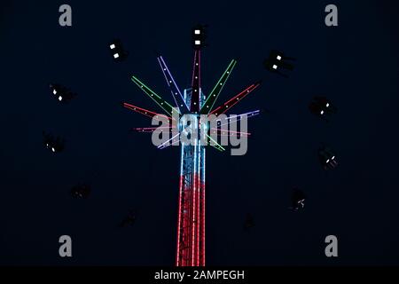 Amusement park high swing ride at night Stock Photo - Alamy