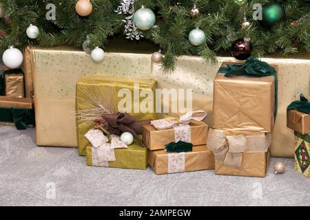 Christmas gifts under a Christmas tree. Stock Photo