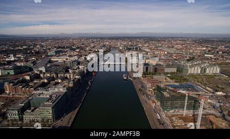 Aerial drone view of the Samuel Beckett Bridge and the river Liffey in Dublin, Ireland. Stock Photo