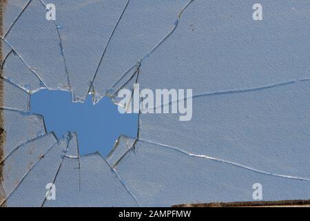 Dirty cracked glass background texture. Stock Photo