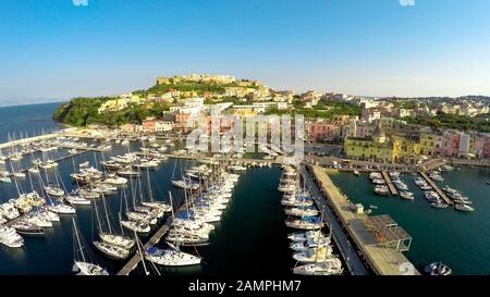 Mediterranean seaside town aerial shot, boats docked in port, summer vacation Stock Photo