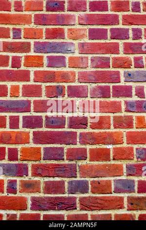 Colorful brick wall as a textured wallpaper or background Stock Photo