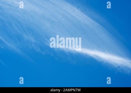 blue sky with beautiful shaped cirrus cloud on a sunny day  but those clouds  predict bad weather Stock Photo