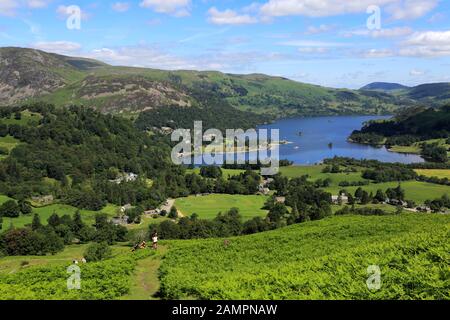 Walkers on Arnison Crag fell, Ullswater, Lake District National Park, Cumbria, England, UK Stock Photo
