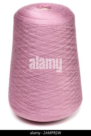 Cone of purple color synthetic or wool threads isolated on white background. Spool of yarn for weaving or knitting used in textile manufacturing Stock Photo