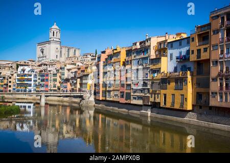 GIRONA, CATALONIA , SPAIN - JUNE 15, 2019: historical jewish quarter in Girona with Eiffel Bridge at sunrise, Barcelona, Spain, Catalonia Stock Photo