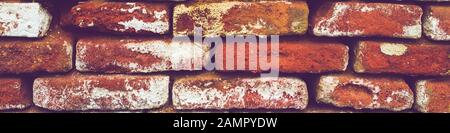 Rough brickwork with large gaps between the bricks. Stock Photo