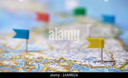 Travel destinations in North America marked with pins on world map, tourism Stock Photo