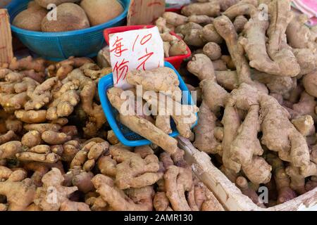 Ginger root spice for sale on a market stall, Kowloon Hong Kong Asia Stock Photo