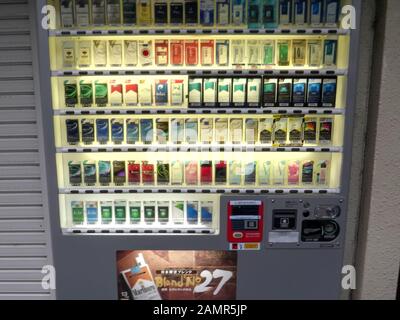 KYOTO, JAPAN - APRIL, 16, 2018: wide view of a cigarette vending machine in kyoto Stock Photo